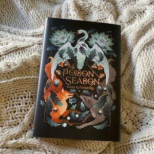 Owlcrate exclusive edition of “The Poison Season” by Mara Rutherford